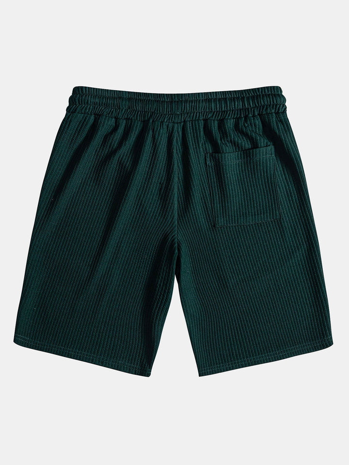 Shirt and shorts with nervous button